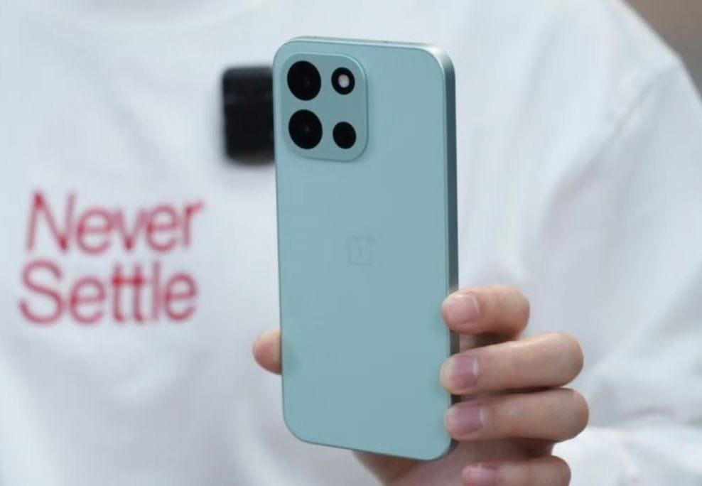 Leaked image of the OnePlus Turbo 6 in a light blue color, showing the rear camera setup and OnePlus logo.