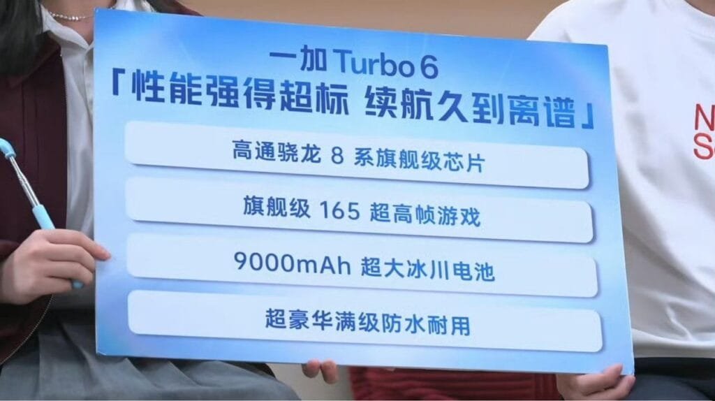 Image of a sign listing key specifications for the OnePlus Turbo 6, including Snapdragon 8 series chip, 165Hz refresh rate, 9000mAh battery, and advanced waterproofing.
