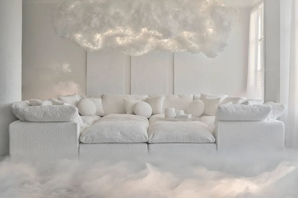 A soft, calming shade of white with subtle hints of pale blue and gray, reminiscent of a serene sky filled with gentle clouds, representing Pantone's Color of the Year 2026, "Cloud Dancer."