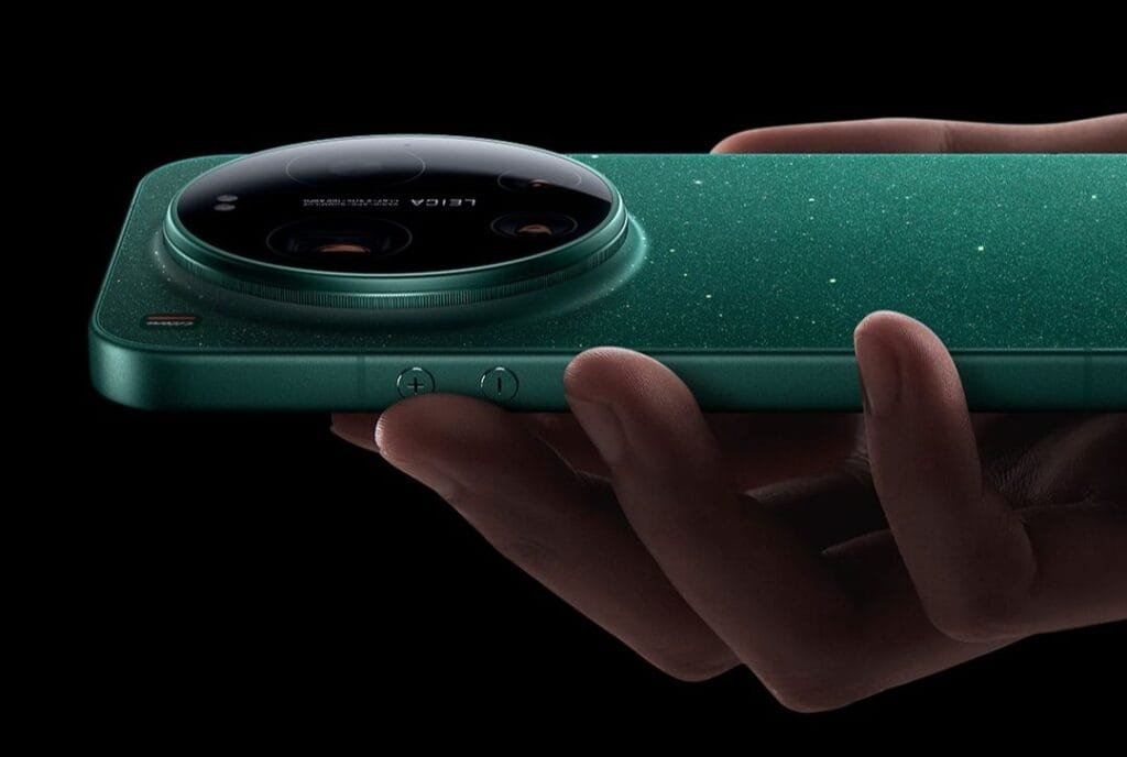 The Xiaomi 17 Ultra is Now Official in China with Special Edition by Leica 2 Close-up of a hand holding the green, speckled Xiaomi 17 Ultra, highlighting its large circular camera module with Leica branding and side volume buttons.