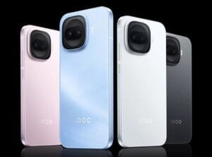 Rear view of the iQOO Z11 Turbo shown in four color options—Halo Pink, Floating Light blue, Sky White, and Midnight Black—featuring a flat metal frame, glass back, and a rounded-square dual-camera module with iQOO branding.
