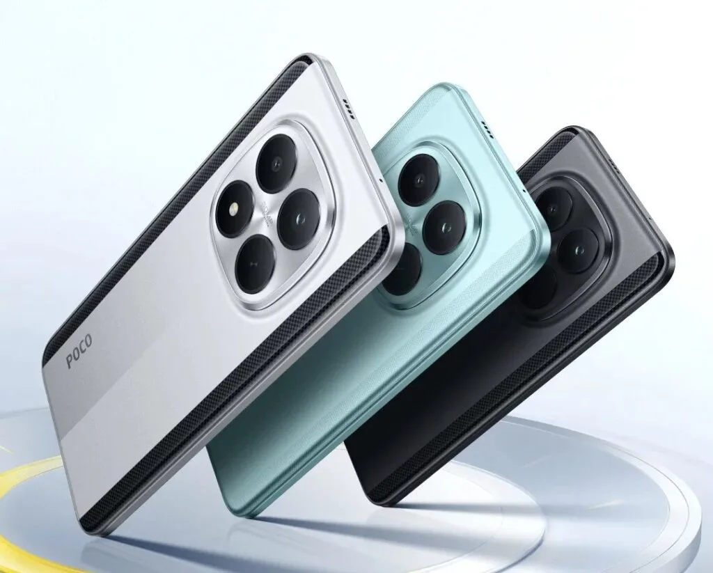 POCO M8 5G and POCO M8 Pro 5G Officially Launched in the Philippines 1 POCO M8 Pro 5G smartphones displayed from the rear, arranged in a stacked, angled formation against a light, glossy background with subtle yellow accents. Three color variants are shown: silver with black carbon fiber-inspired side accents, light blue with a smooth textured finish, and matte black with matching side accents. All feature a prominent square camera module housing four lenses, with the 'POCO' logo printed vertically near the bottom edge of the back panel.
