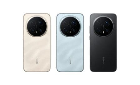 A product shot of the Honor Magic 8 Pro smartphone, displaying three color variants against a white background: (from left to right) a light beige, a pale blue, and a matte black finish. Each model features a large circular rear camera module with multiple lenses, plus a subtly textured back surface and the "HONOR" brand logo printed below the camera area.
