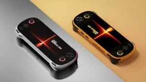 Two KONKR FIT handheld gaming consoles, one in Luminous Silver and one in Dragonveil Gold, resting on a split-tone reflective surface.