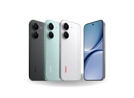 A professional product render of the Redmi Turbo 5 smartphone shown in three colors: Shadow Black, Light Sea Green, and Auspicious Cloud White. The image displays the flat back panels of three units, highlighting their vertically aligned dual-camera lenses, alongside a fourth unit facing forward to show a flat AMOLED display with a centered punch-hole camera and slim bezels.