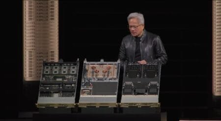 Samsung Electronics Reveals Next-Gen HBM4E Memory for AI Systems at NVIDIA GTC 2026 Jensen Huang, CEO of NVIDIA, presents new server hardware at GTC 2026, showcasing the intricate internal components of three server racks on stage.