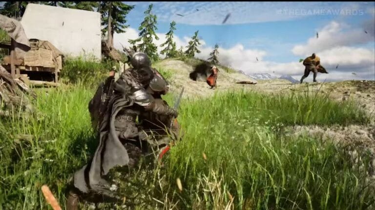 Gameplay scene from Crimson Desert shown at The Game Awards – a heavily armored character in dark gear crouches in tall green grass, with other figures and action effects visible on a sunlit, forested hillside in the background.