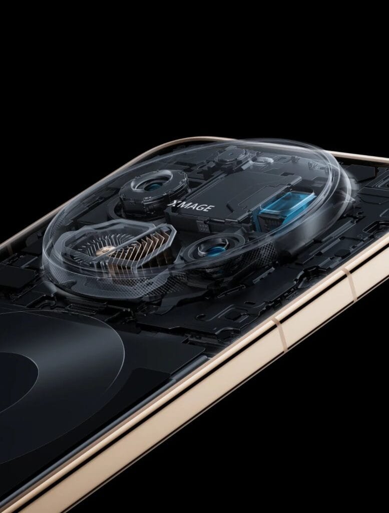 Cutaway view of HUAWEI smartphone’s camera module, revealing internal components and the XMAGE branding. The device has a gold-toned frame, with transparent casing over the camera hardware to showcase engineering design.
