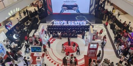 nubia Neo 5, Neo 5 Pro, and Neo 5 GT Launch in the Philippines with Unisoc and Dimensity Chips Overhead view of nubia Neo 5 Series launch event in a mall – large screen displays 'BORN TO WIN PRODUCT LAUNCH', 'NEO 5 SERIES' signage, arranged seating, and crowds of attendees exploring booths.