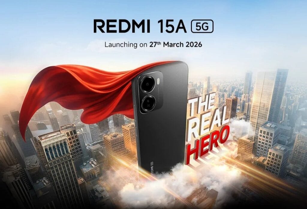 Redmi 15A 5G Teased Ahead of March 27 Launch in India 1 Promotional poster for Redmi 15A 5G. Black smartphone with red superhero cape above a cityscape. Text shows 'Redmi 15A 5G', launch date 27th March 2026, and tagline 'THE REAL HERO'.