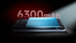 Internal view of Redmi 15A highlighting its 6300 mAh blue battery, with phone casing open against a dark background.