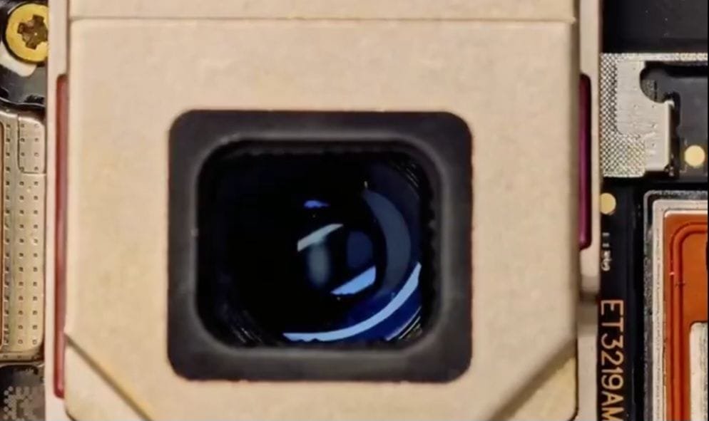 Close-up view of the periscope telephoto lens module of the Vivo X300 Ultra, showing the large square lens housing and internal optics designed for high-zoom photography.