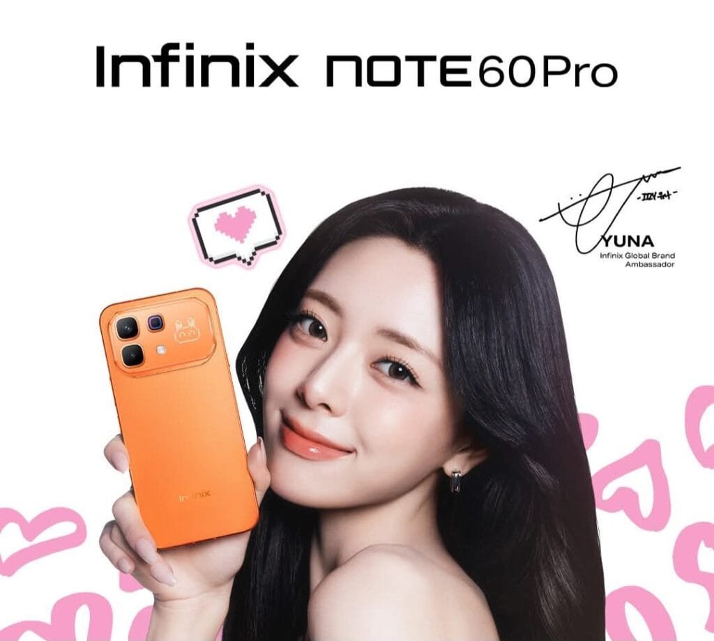 Infinix Note 60 Pro Launched in India; Price Starts at Rs 31,999 Promotional photo of Infinix Note 60 Pro in Solar Orange held by global brand ambassador Yuna, with pink heart graphics and signature on a white background.