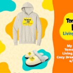 Promotional image for My Nintendo Tomodachi Life: Living the Dream - Cozy Dream Sweepstakes, featuring a beige hoodie, white water bottles, and fluffy slippers, all branded with the Tomodachi Life logo, against a vibrant yellow and orange background with the Nintendo Switch and My Nintendo logos