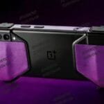 OnePlus Reportedly Working on Android Gaming Handheld, First Look Surfaces 3 Rendered image of a OnePlus gaming handheld device with a black back panel featuring the OnePlus logo, and purple textured grips on each side. The device shows a triple camera setup and appears to be designed for horizontal gaming with integrated controls. Watermarks with "804598760 2026/04/06" are visible.