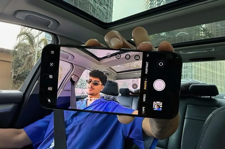 ealme 16 camera demo showing selfie mirror feature in use inside a car