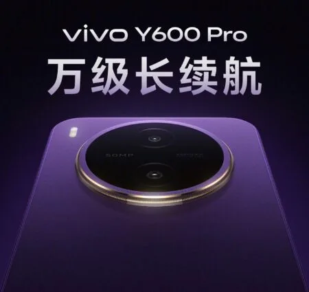 Vivo Y600 Pro Teased with 10,200mAh Battery and Dimensity 7300e Chip Promotional poster for the vivo Y600 Pro smartphone in a striking purple finish, showcasing its large circular camera module with a gold ring and 50MP labeling. The text highlights 'Extraordinary Long Battery Life' and 'Coming Soon' against a dark gradient background.
