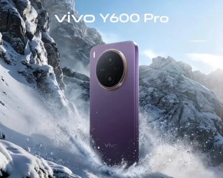 vivo Y600 Pro smartphone in purple finish displayed against a snowy mountain background with water splashing effects