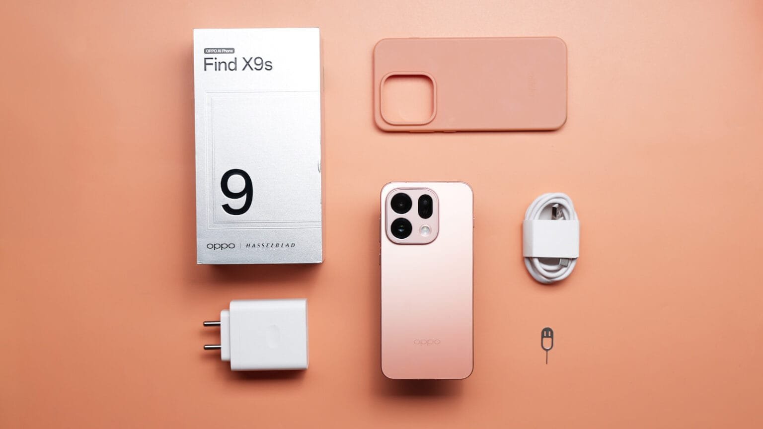Oppo Find X9s Launched in India; Price Starts at ₹79,999 Oppo Find X9s pink variant with retail box, charger, cable, case and accessories