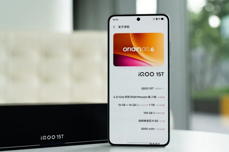 iQOO 15T display showing OriginOS 6, Dimensity 9500 Monster, 16GB RAM, 1TB storage, 8000mAh battery