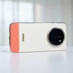 Honor X80 Pro Max Confirmed to Launch with 11,000 mAh Silicon‑Carbon Battery 1 Honor X80 Pro Max rear view in two‑tone white and coral finish, large circular camera module, vertical Honor logo, premium design on white surface.