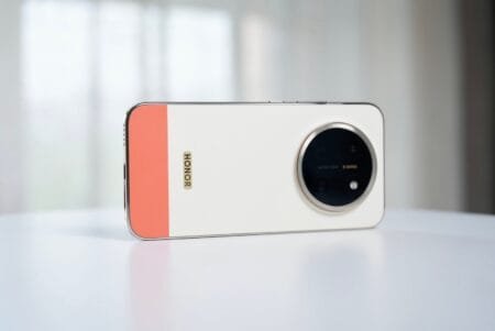 Honor X80 Pro Max Confirmed to Launch with 11,000 mAh Silicon‑Carbon Battery Honor X80 Pro Max rear view in two‑tone white and coral finish, large circular camera module, vertical Honor logo, premium design on white surface.