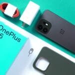 OnePlus N6 in Midnight Green shown with retail packaging, 45W fast charger, red USB‑C cable, silicone case, and documentation