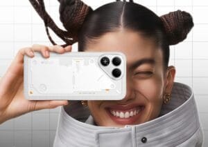 Tecno Pova 8 in white finish shown from back, featuring Active Matrix rear design, triple‑camera module, and POVA branding, held against a light grid background.
