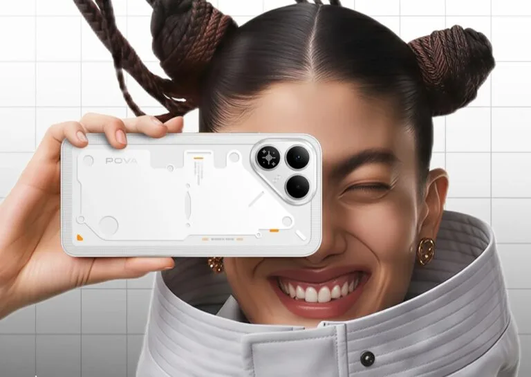 Tecno Pova 8 in white finish shown from back, featuring Active Matrix rear design, triple‑camera module, and POVA branding, held against a light grid background.