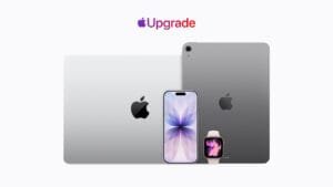 Apple Upgrade logo above a silver MacBook, iPhone 17 with purple floral wallpaper, space gray iPad, and Apple Watch with a pink and purple watch face