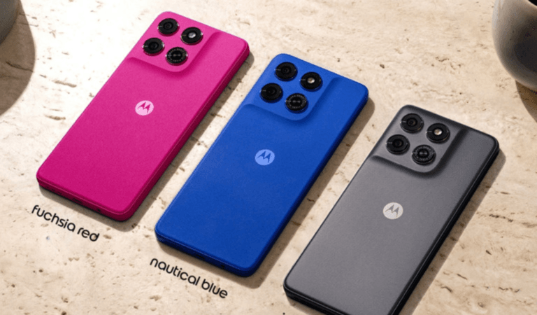 Rear view of the Motorola Moto G77 Power in three color variants: Fuchsia Red, Nautical Blue, and Impenetrable Gray, showing the quad-camera module and centered Motorola logo on a textured matte finish.