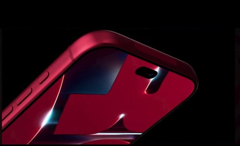 Close-up side view of the Apple iPhone 18 Pro in Dark Cherry finish, showing its glossy red back panel, rear camera cutout, and side buttons against a dark background.