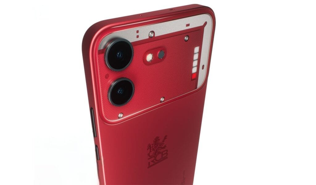 Nothing Phone (4b) Launched with Snapdragon 6 Gen 4 and New Glyph Bar Design 1 Close-up rear view of the matte red Nothing Phone (4b) RCB Edition, showing its textured camera module housing dual lenses, the signature Glyphs Bar light strip, and the engraved Royal Challengers Bengaluru (RCB) team logo on the lower back.