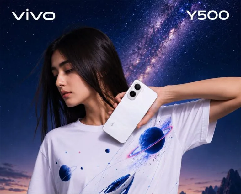 Vivo Y500 4G Launched in Pakistan with 8,100mAh Battery and Unisoc T7300 Chipset Official promotional shot of the Vivo Y500 4G. A model holds the Pearl White variant of the phone, showing its smooth back panel and dual rear camera module. The "vivo" logo appears at the top left and "Y500" at the top right, set against a starry Milky Way night sky background.