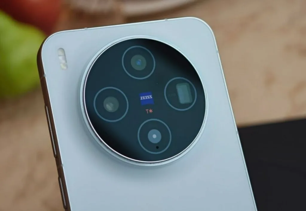 Back view of vivo X500 Pro smartphone showing its signature circular Zeiss T* camera module with four lenses, in matte light blue finish