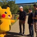 Pikachu Visits Apple Park as Tim Cook Hosts Pokémon Team Ahead of CEO Transition 1 Tim Cook offers an apple to Pikachu alongside The Pokémon Company CEO Tsunekazu Ishihara and John Ternus at Apple Park campus