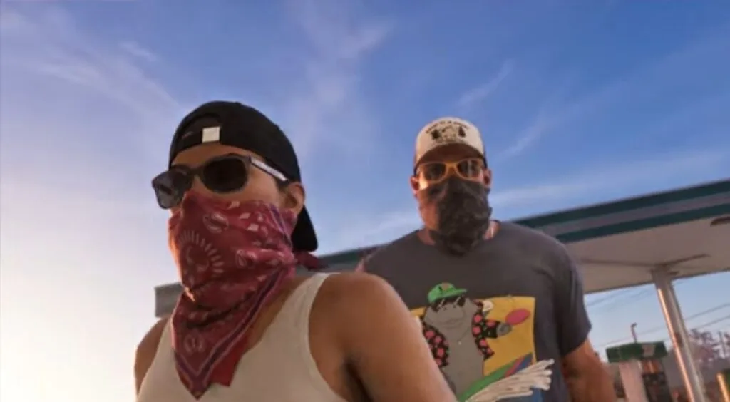 GTA 6 Extended Look Released: Everything Shown in the 27-Minute Video 3 GTA 6 Extended Look gameplay showing Lucia and Jason wearing bandanas and masks during a robbery scene at a gas station, Leonida criminal mission.