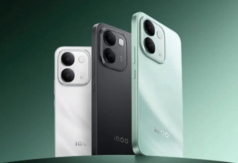 iQOO Z11S Launched With MediaTek Dimensity 7500 and Massive 10,000mAh Battery iQOO Z11S three color variants shown from rear view: Wanli Floating Light white, Ink Rock Black, and Snow Island Green, featuring vertical dual-camera module with square frame and centered iQOO logo on gradient green background.