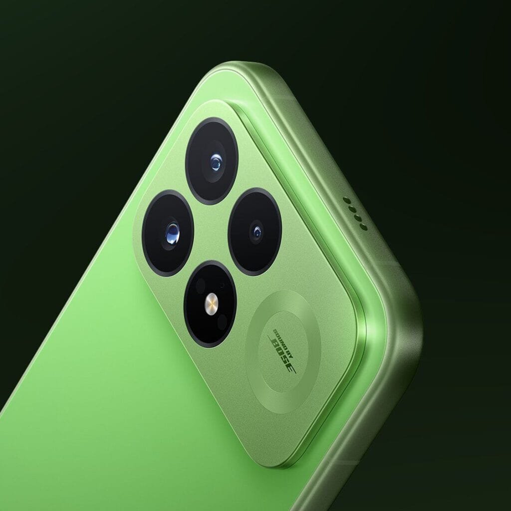 Redmi K100 Pro Glowing Firefly Variant Unveiled 3 An angled close-up view of the Redmi K100 Pro's upper rear corner, highlighting the matte green finish of the square camera island, the four black camera lens cutouts, the circular "Sound by Bose" design element, and the speaker grille on the top edge of the frame.