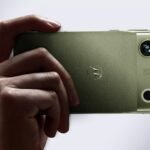 Motorola Signature 27 Teased with Unusual Horizontal Camera Design 1 Motorola Signature 27 in pale olive green shown from the back with horizontal camera module, 200MP LYTIA superzoom lens, B&O audio branding, and Motorola logo
