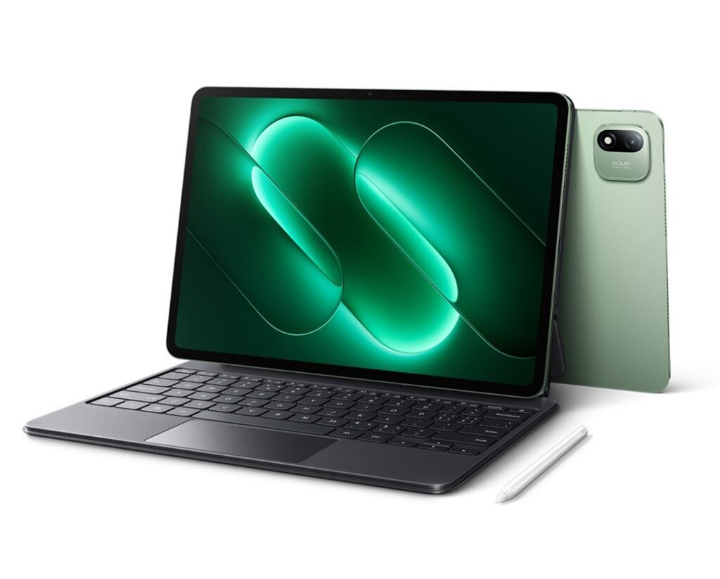 Xiaomi Pad 9 Pro Launched in China with Snapdragon 8 Gen 5 and 11,000mAh Battery Xiaomi Pad 9 Pro tablet with attached keyboard and stylus placed beside it. Light green back panel visible with square camera module. Screen shows glowing green abstract design. White background. Official product image.