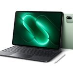 Xiaomi Pad 9 Pro Launched in China with Snapdragon 8 Gen 5 and 11,000mAh Battery 4 Xiaomi Pad 9 Pro tablet with attached keyboard and stylus placed beside it. Light green back panel visible with square camera module. Screen shows glowing green abstract design. White background. Official product image.