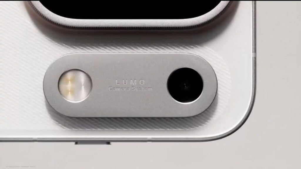 Oppo Just Announced the Find X10 Series Launch Date and Here Are the Details 2 Close up of Oppo Find X10 Pro Max LUMO camera system. Silver oval module with dual tone flash and small lens. Text reads LUMO Camera System. Screenshot by Wazzuptechph from official teaser video.