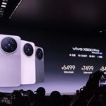 Vivo X500 Pro Launched in China with Dimensity 9600 Pro, 2K Amoled Display, and Sony LYTIA L910 4 Vivo X500 Pro launch event showing four color variants on stage display with pricing 6499 to 8499 CNY, audience capturing photos