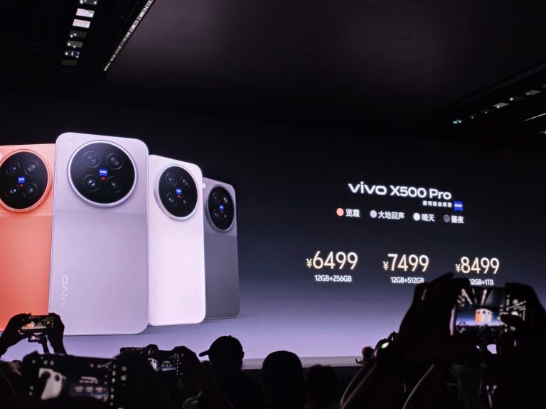 Vivo X500 Pro launch event showing four color variants on stage display with pricing 6499 to 8499 CNY, audience capturing photos