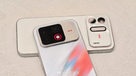 Honor WIN2 rear design with gradient finish silver camera module glowing red WIN indicator light and detachable accessory panel.