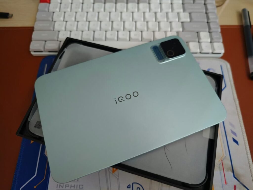 iQOO Pad Pro Hands-on: Quick Overview, Full Specs and Price 4 Rear‑view shot of the Ice Blade Blue iQOO Pad Pro resting inside its retail box, showing the iQOO logo and rear camera module.