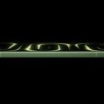 Redmi K100 3C Certified. Rumored Battery May Exceed 10,000mAh 2 Redmi K100 side profile in green finish with glowing neon green design on screen against black background