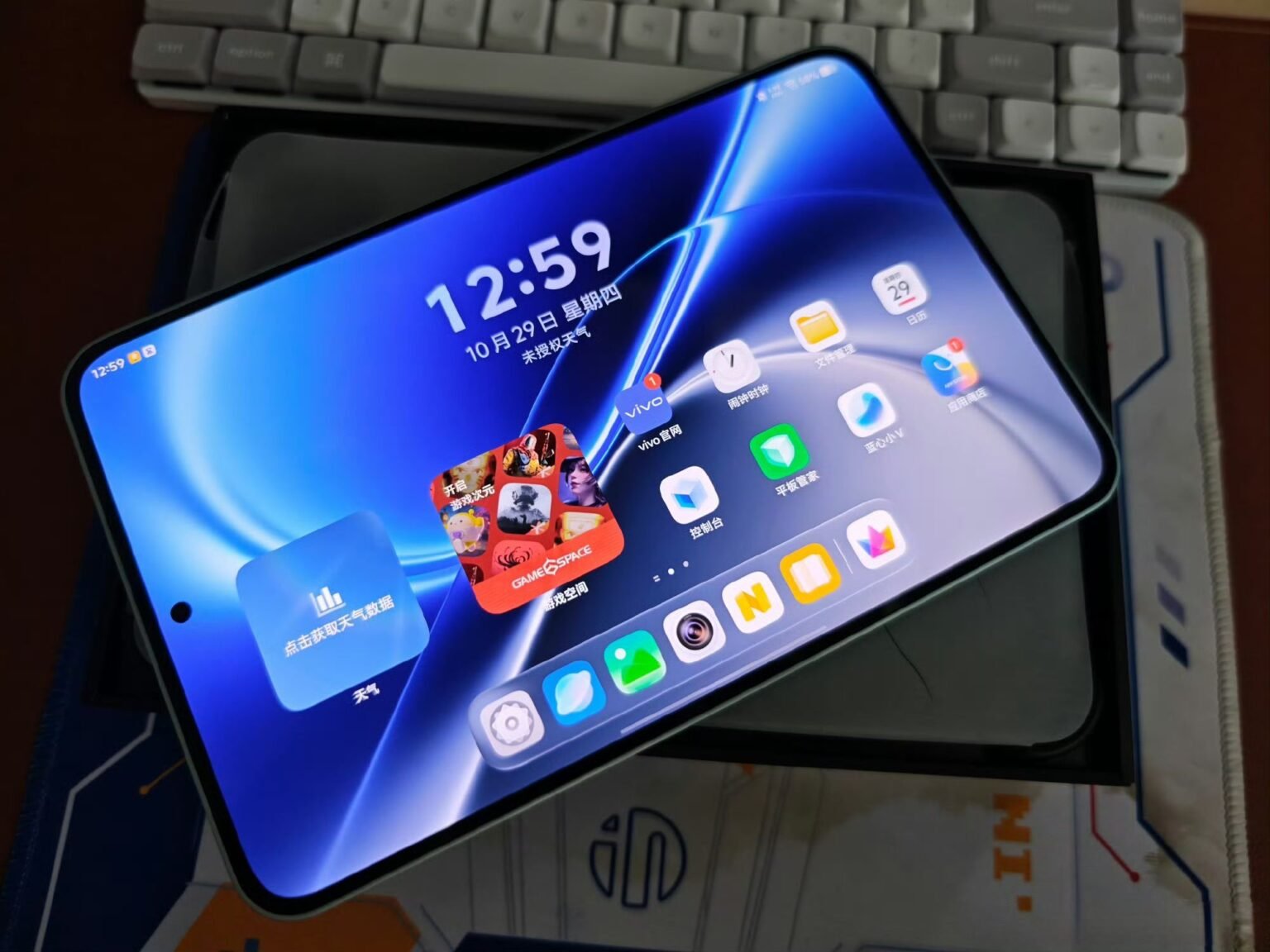 iQOO Pad Pro Hands-on: Quick Overview, Full Specs and Price Front‑screen shot of the iQOO Pad Pro showing its default OriginOS 7 HD home screen with Game Space and other pre‑installed application icons.