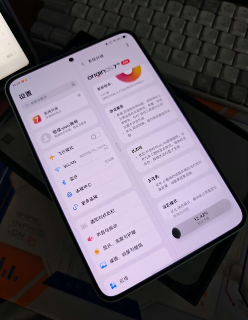 iQOO Pad Pro Hands-on: Quick Overview, Full Specs and Price 2 Angled shot of the iQOO Pad Pro displaying its OriginOS 7 HD system update page listing new gaming‑related features.